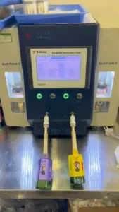 Two FiHP 600K 6in1 devices connected to a dual-channel suction testing station